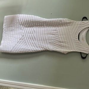 Beautiful white Calvin Klein dress. Makes your curves pop in this dress!